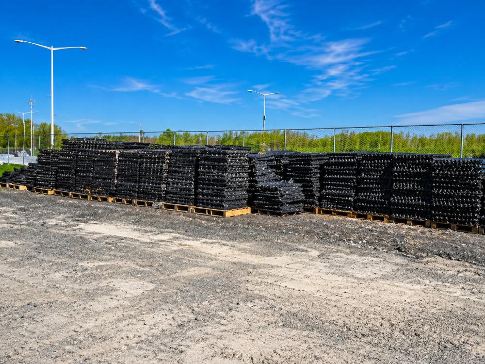 GTR Turf synthetic field drainage base materials staged on-site for sports field construction and installation.
